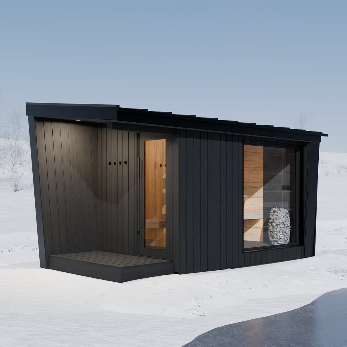 Sauna Ikigai 7 op een houten terras in een besneeuwd landschap, de gesloten vestibule en beglaasde saunaruimte beide warm verlicht