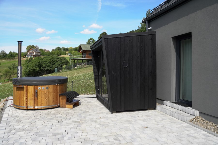 Sauna being positioned on prepared site